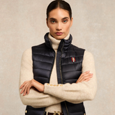Woman Wears Holland Cooper Team Lightweight Gilet in Ink Navy